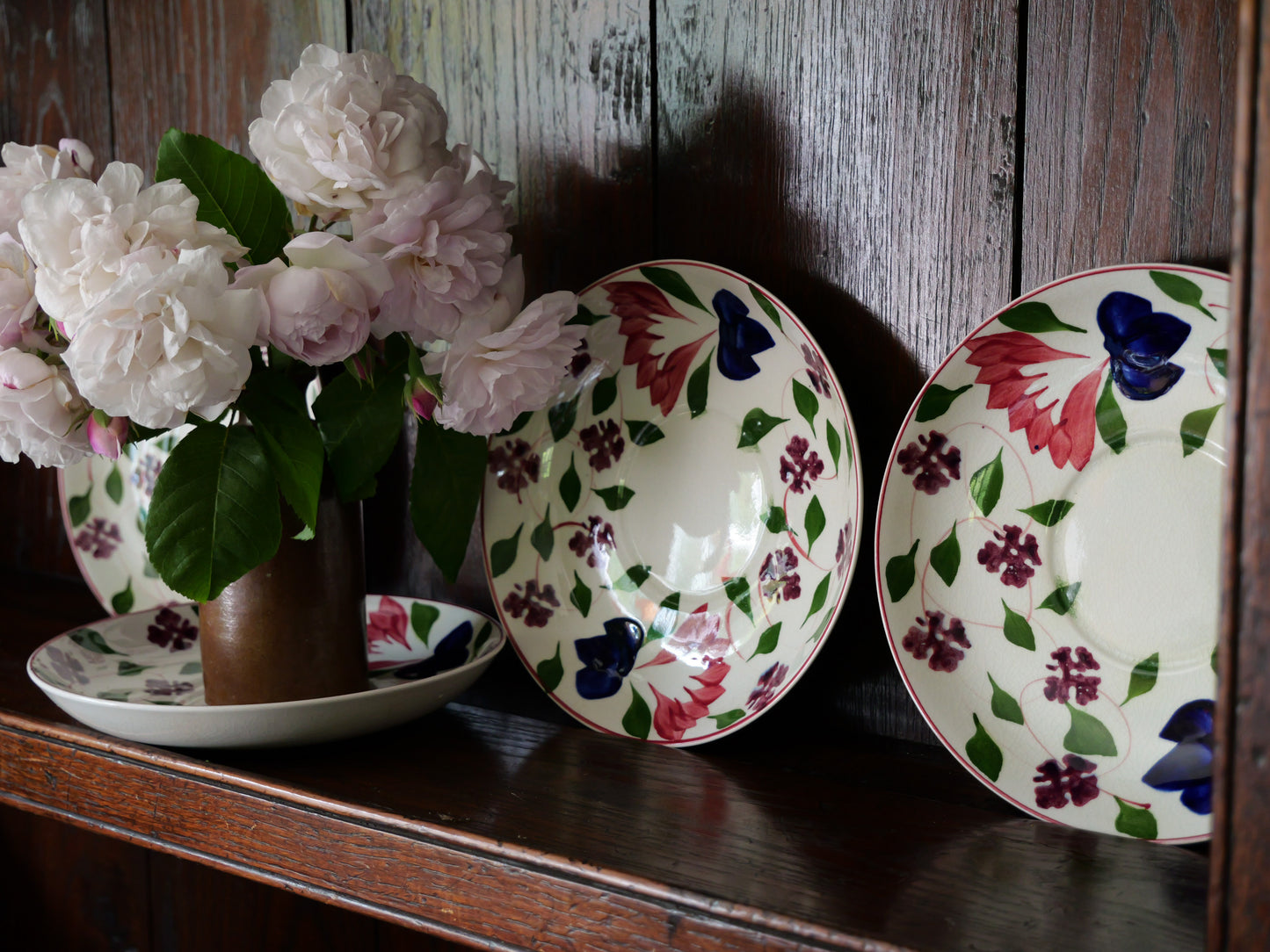 Set of four small vintage spongeware plates/saucers
